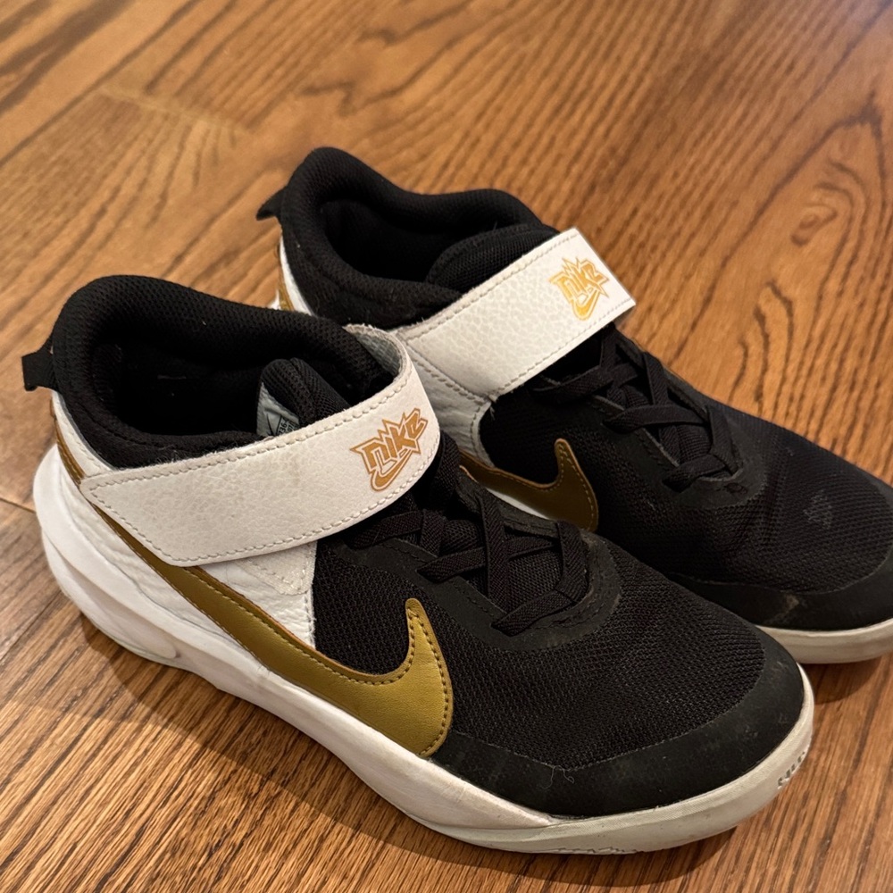 Nike Kids Black and Gold Sneakers